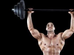 Features of basic and isolation exercises for shoulders