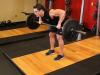 Bent-over barbell rows to the chest - developing the rear deltoids Who, when and how much